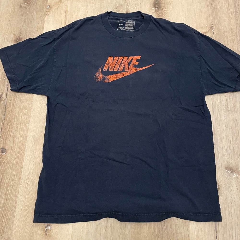 Vintage Nike T shirt. Naturally Faded logo print